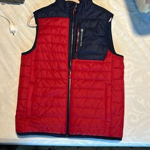 Vineyard Vines performance lines best. Navy and red in color and never worn.